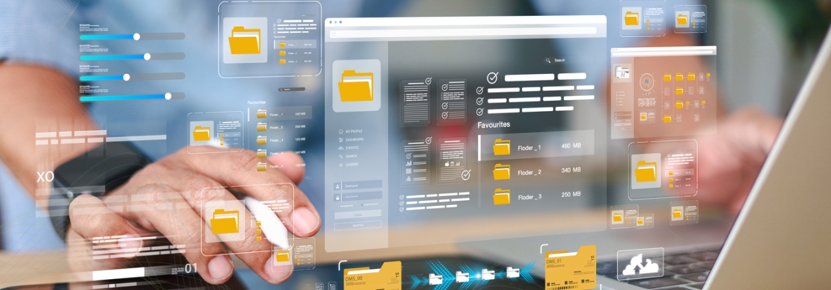 A person uses a laptop and tablet, with floating digital folders and interface graphics representing file management and data organization—highlighting challenges like a website not generating leads.
