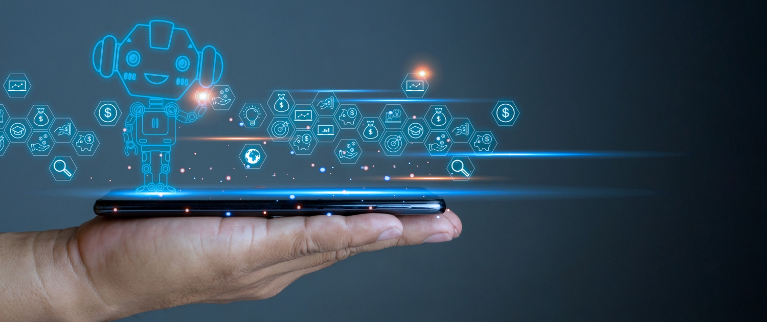 A hand holds a smartphone with blue holographic icons and a robot figure projected above it, symbolizing artificial intelligence and technology.