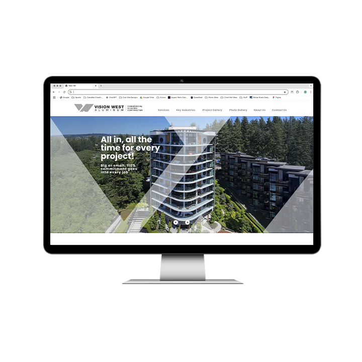 AG Client Page Vision West BV2 A computer monitor displaying the Vision West Aluminum website homepage, featuring a high-rise building and the headline All in, all the time for every project!.