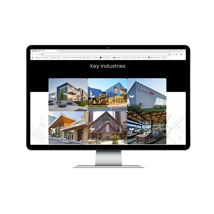 AG Client Page Vision West Web2 A computer monitor displaying a website section titled Key Industries featuring a grid of six architectural photos of commercial buildings.