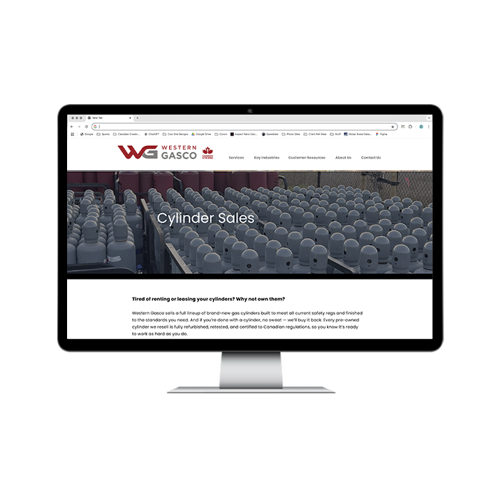 AG Client Page Western Gasco Web3 Computer monitor displaying the Western Gasco website homepage featuring a banner titled Cylinder Sales over an image of gas cylinders and information about purchasing new and refurbished cylinders.